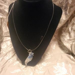 Clear with blue resin feather pendant handmade
